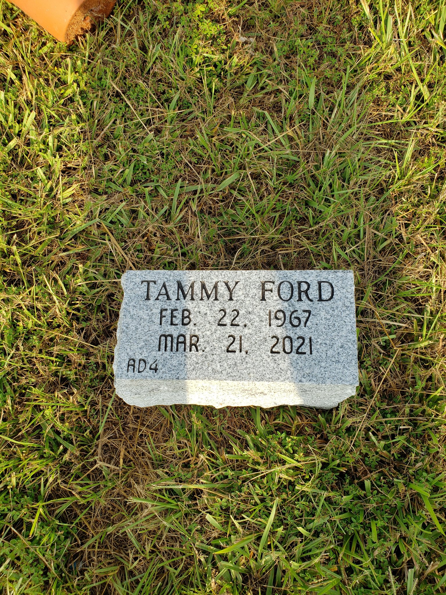 Cemetery gravestone inlaid in the ground — Tammy Ford, February 22, 1967 – March 21, 2021